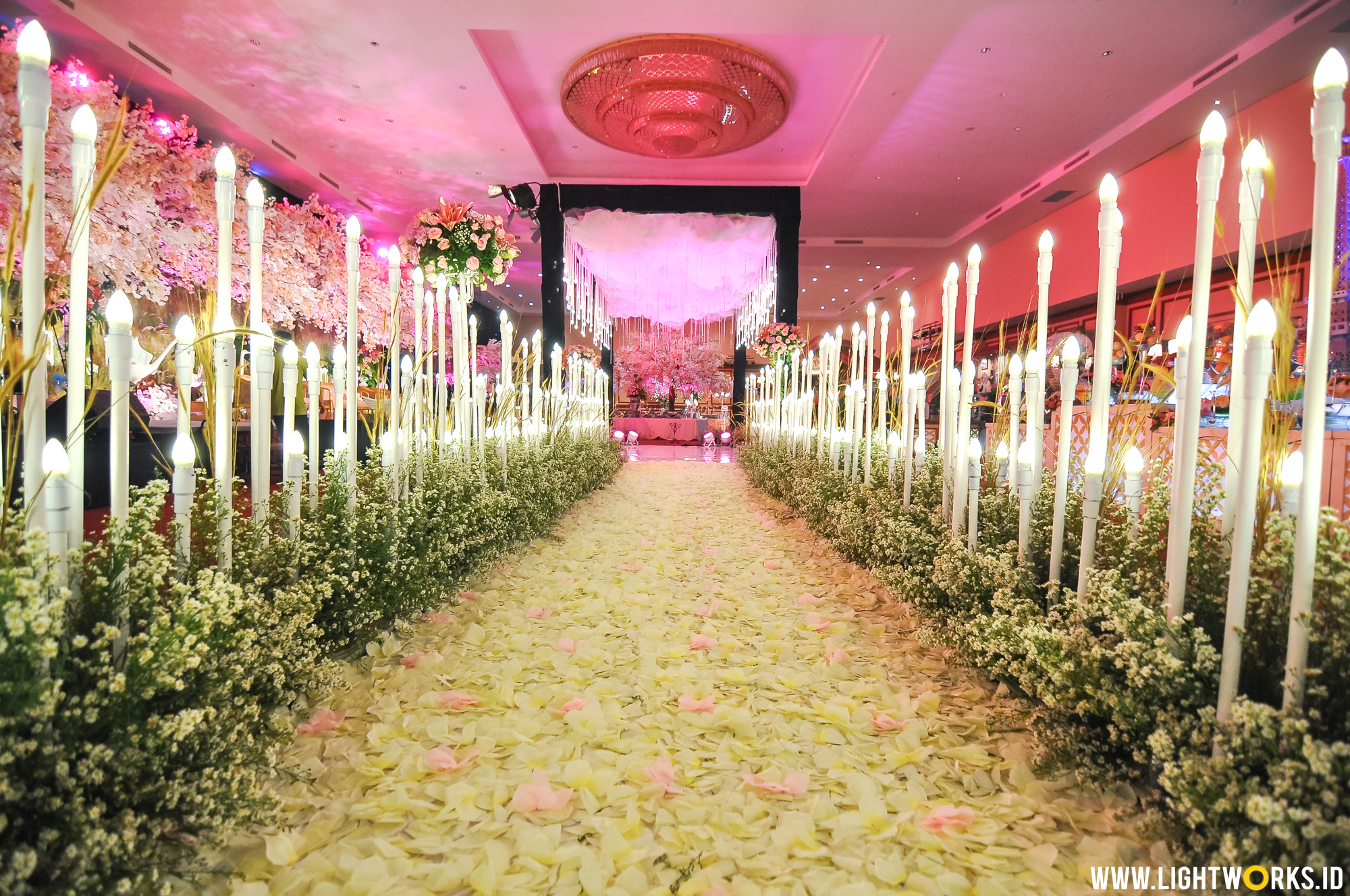 Asa and Mahesa’ wedding reception | Venue at Ijen Suites Resorts and Convention | Decoration by Azalia Decor | Organised by Indies Organizer | Host by Ersa Mayori | Guest Star by Ari Lasso | Photo and video by Triyasha Photo | Catering by Sonokembang Catering Malang | Brush by Juwita Rias Pengantin | Gown by Rasya Shakira | Orchestra by Tembangan | Sound by GMC Sound System | Usher by Gabs’st Model Agent | Make up usher by Dewi Ruliyati | Souvenir by Fine Wedding Souvenir | Car by The Lily | Lighting by Lightworks