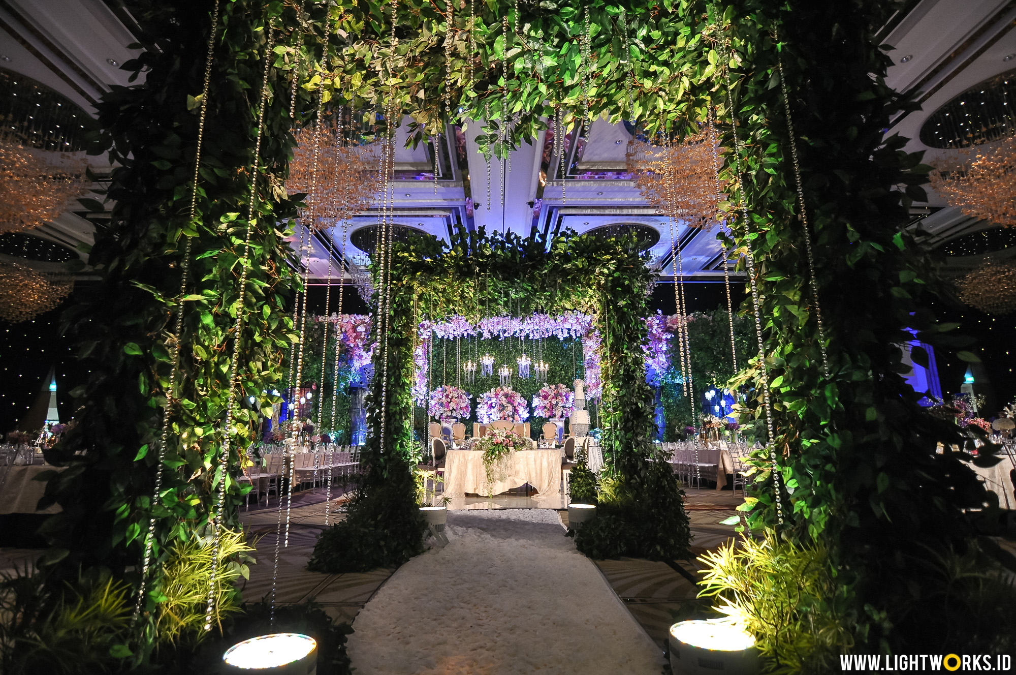 Shaun and Melissa’s wedding reception | Decoration by Steve Decor | Organised by Excellent Organizer | Dress by Adrian  Gan | Mother’s dress by Yefta Gunawan | Tux by Adamist Men | MUA by Anpasuha | Hairdo by Woko S | Custom belt and headpiece by Rinaldy Yunardi | MC by Becky Tumewu and Patty Tumewu | Entertainment by Wawan Yap Entertainment | Cake by LeNovelle Cake | Photo and video by Indra, Nomina Photography | Souvenir by Rosewood Boxes & Hampers, Clementines | Invitation by Blue Label | Photobooth by Lolphotobooth.co | Catering by Narayas Kitchen | Lighting by Lightworks