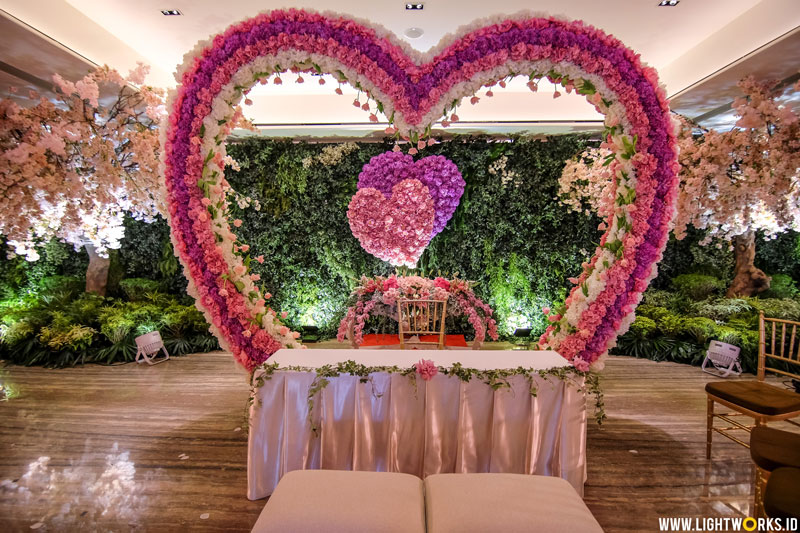 Venue at Grand Hyatt Jakarta | Decoration, corsage, and handbouquet by Nefi Décor | Oganised by Yoan Ilona | MUA: Susy Kleo | Photo and video by PPF Photo | Gown by Adrian Gan | Attire by Double L’Uomo | Ballet Perfomance by Claresta Alim | Entertainment by Oktav Entertainment | MC: Becky Tumewu and Abraham Auw | Invitation by iCreation Card | Souvenirs by Ellinorline Gift and Souvenir | Lighting by Lightworks 