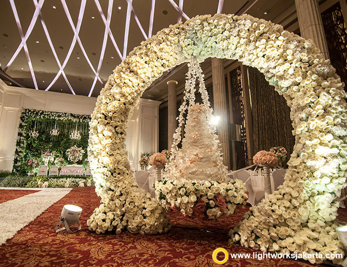 Christian and Felicia’s Wedding Reception | Venue at Bali Room Hotel Indonesia Kempinski Jakarta | Organiser by Divine WO | Entertainment by Andrew Lee Entertainment | Photo by PPF Photography | Video by Wimo Production | Gown by Yefta Gunawan | Make Up by Susy Kleo | Wedding Cake by Cream and Lace | Decoration by Lotus Design | Lighting by Lightworks