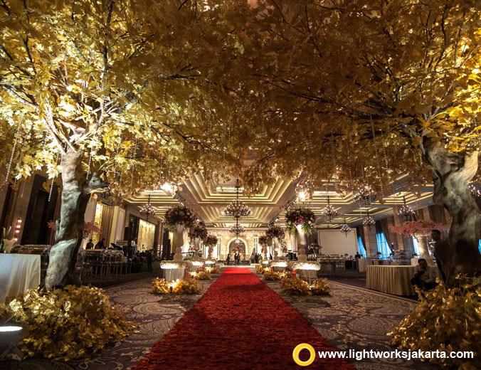 Tristan and Priska’s wedding reception | Venue at Grand Ballroom Kempinski | Decoration by DeSketsa Decoration | Organised by MKE | Lighting by Lightworks Jakarta