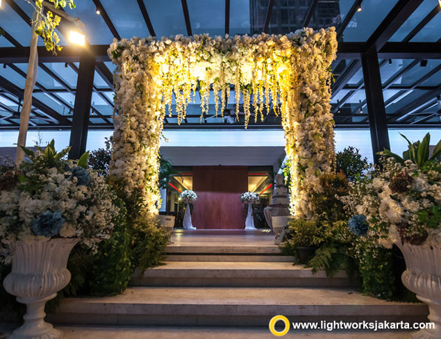 Gerry and Seni’s wedding reception | Venue at Grand Hyatt Jakarta | Organised by Eugene Organizer | Decoration by Steve Decor | Music by Wawan Yap | Wedding Cake by LeNovelle Cake | Photobooth by Socialive | Photo and video by Creatopics | Lighting by Lightworks Jakarta