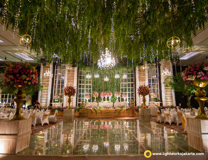 Ivan and Viena wedding reception | Venue at Fairmont Hotel Jakarta | Decoration by DeSketsa Decoration | Organised by One Heart Wedding Jakarta | Make up by Anpasuha | Hair do by Penny Hair Do | Wedding robe by Ginger Olive Premium Robes | Dress by Andreas Odang | Crown by Rinaldy A. Yunardi | MC are Indra Herlambang | Entertainment by Red Velvet Entertainment | Lighting by Lightworks