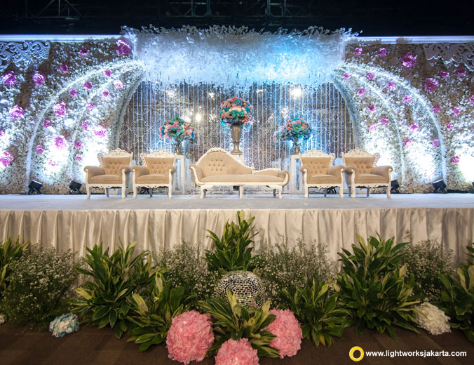Mark and Jennifer wedding reception | Venue at Upperroom Jakarta | Decoration by Angela Decorations | Organised by Perfect WO | Catering by TABLETOP Catering Concept | Photo and Video by Kairos Works | Wedding cake by Timothy Cake Jakarta | Entertainment by Red Velvet Entertainment | Make up by Meica Make Up | Gown by Isaura Fashion Designer | Lighting by Lightworks