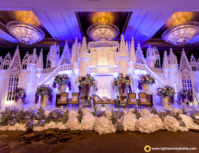 Daniel and Siska’s wedding reception | Decoration by Lavender Decoration | Venue at Hotel Mulia | Organised by Divine Wedding Planner | Cake by LeNovelle Cake | Lighting by Lightworks