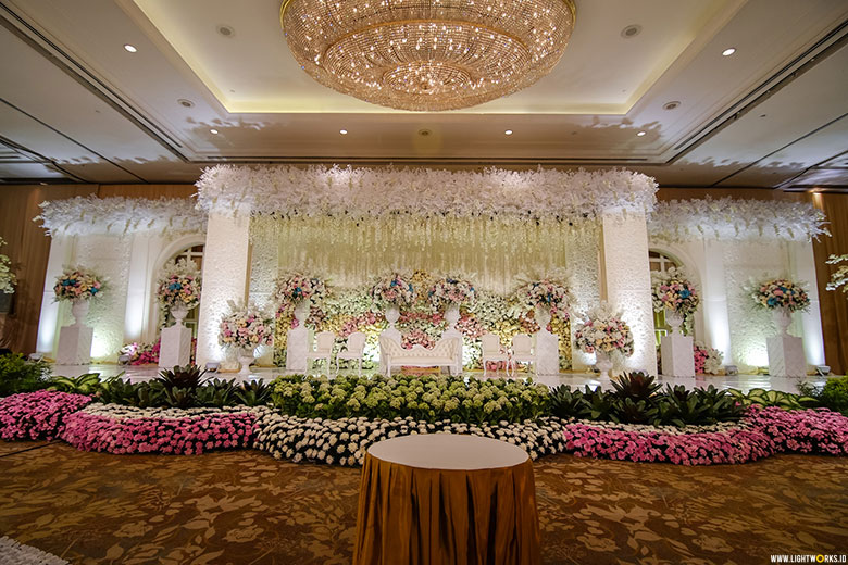 Enrico and Irma’s wedding reception | Venue at Shangri-La Jakarta | Decoration by Arie Décor | Oganised by Irene IWP | Photo and video by Axioo | Gown by Hian Tjen | Crown by Rinaldy Yunardi | MC: Daddo Parus | Music by All Star Music Entertainment | Make up by Priscilla Myrna | Tux by Agus Lim | Usher by Sanggar Opi | Photobooth by Moments To Go | Wedding car by Priority Rent Car | Invitation by Million Yellow | Lighting by Lightworks